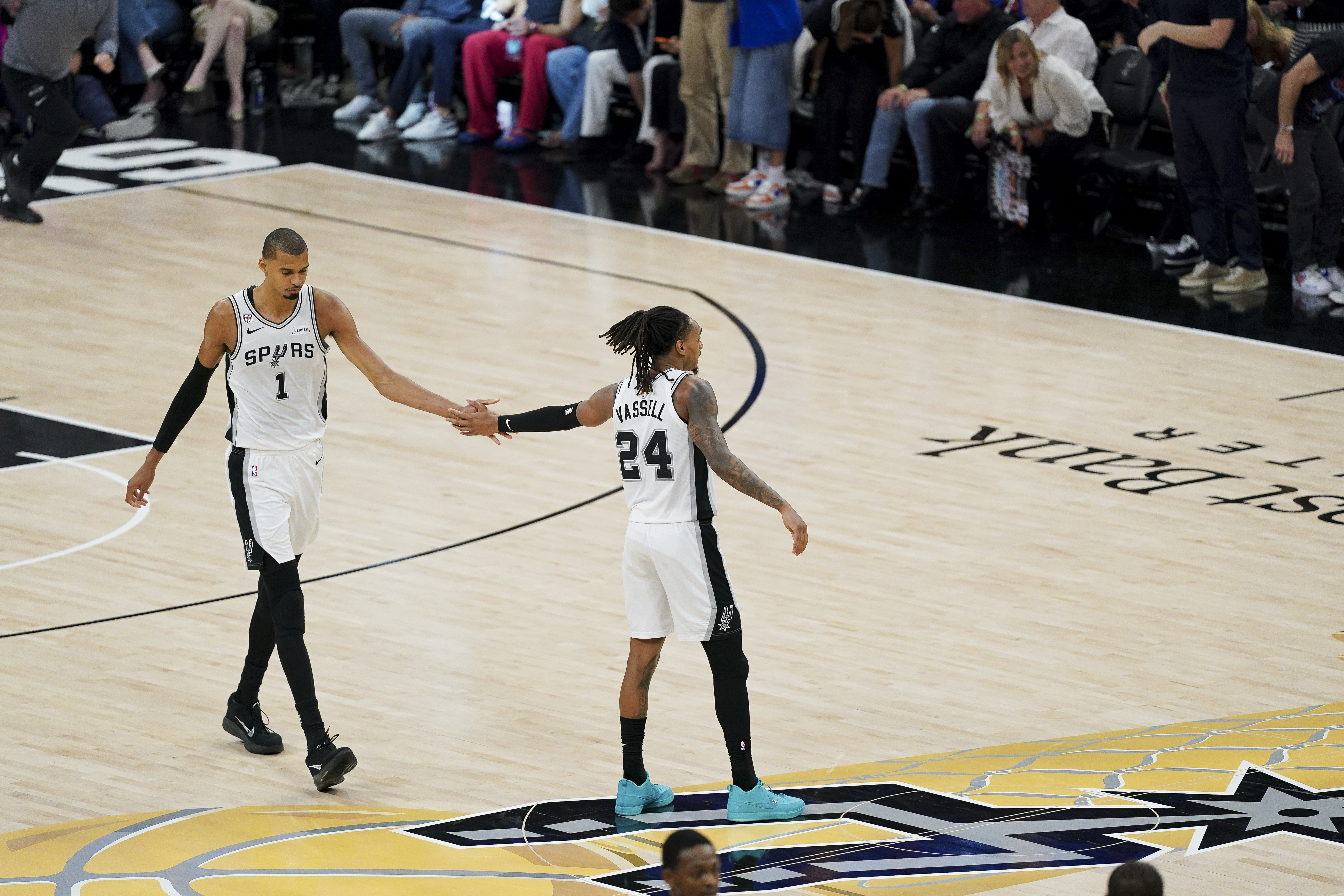 San Antonio Spurs center Victor Wembanyama celebrates with forward Devin Vassell during the NBA Finals
