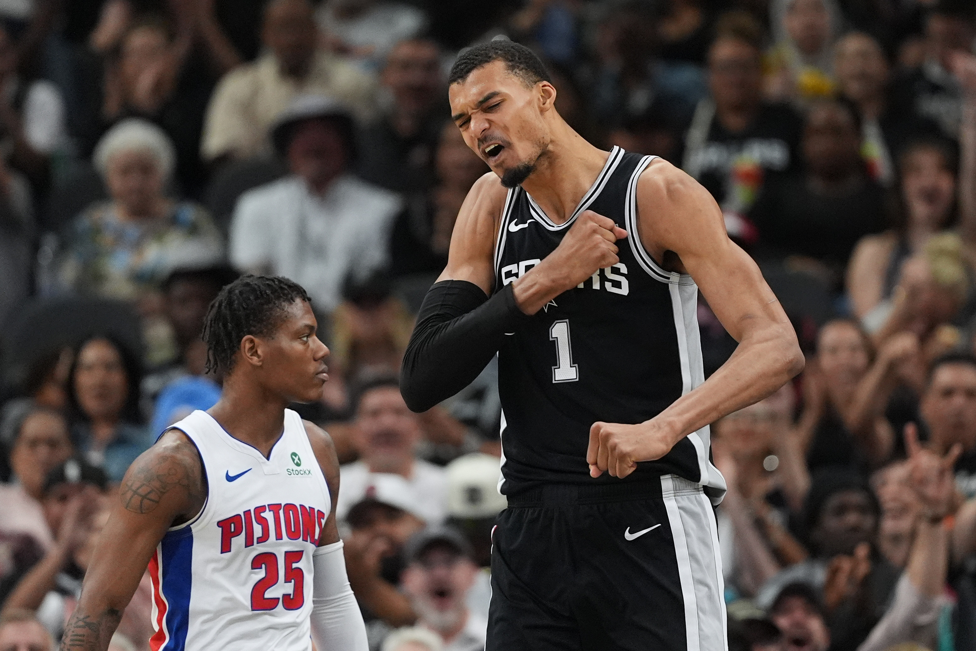 San Antonio Spurs center Victor Wembanyama celebrates against the Detroit Pistons